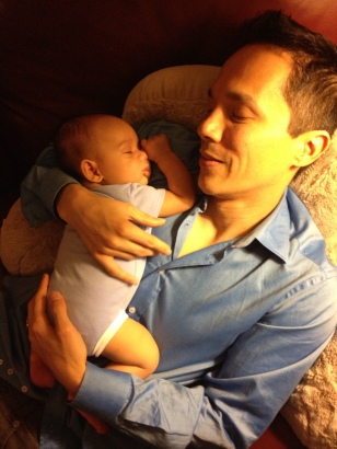 Gio naps on Daddy's chest.